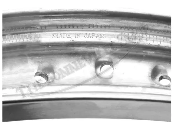A NORTON COMMANDO SHOULDERED VALANCED ALLOY DISC BRAKE FRONT WHEEL RIM WM X SPOKE