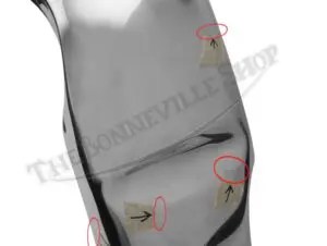 Shiny fender with marked imperfections.