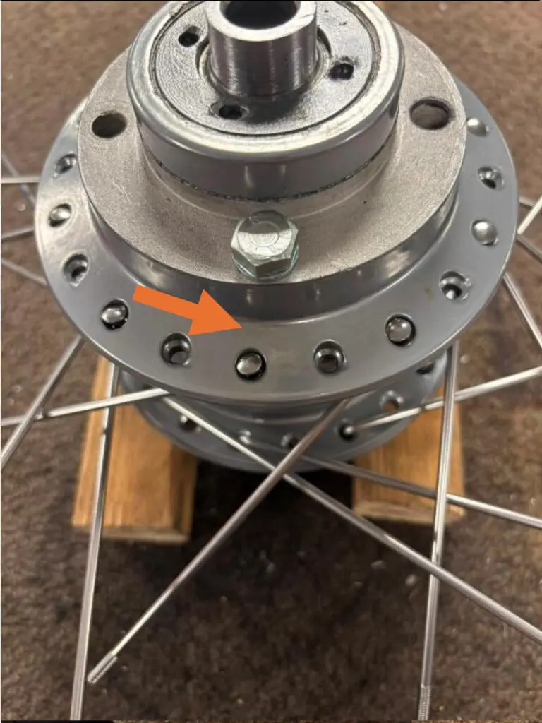 7. Important! If not, you may need to move all spokes round one hole on just one side of the hub.